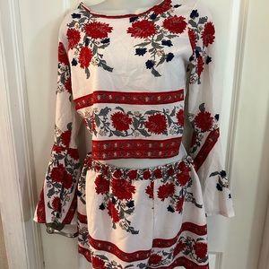 Two piece back less outfit.